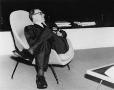 Eero Saarinen lounging in a Womb chair. Image Courtesy of Yale University Library.